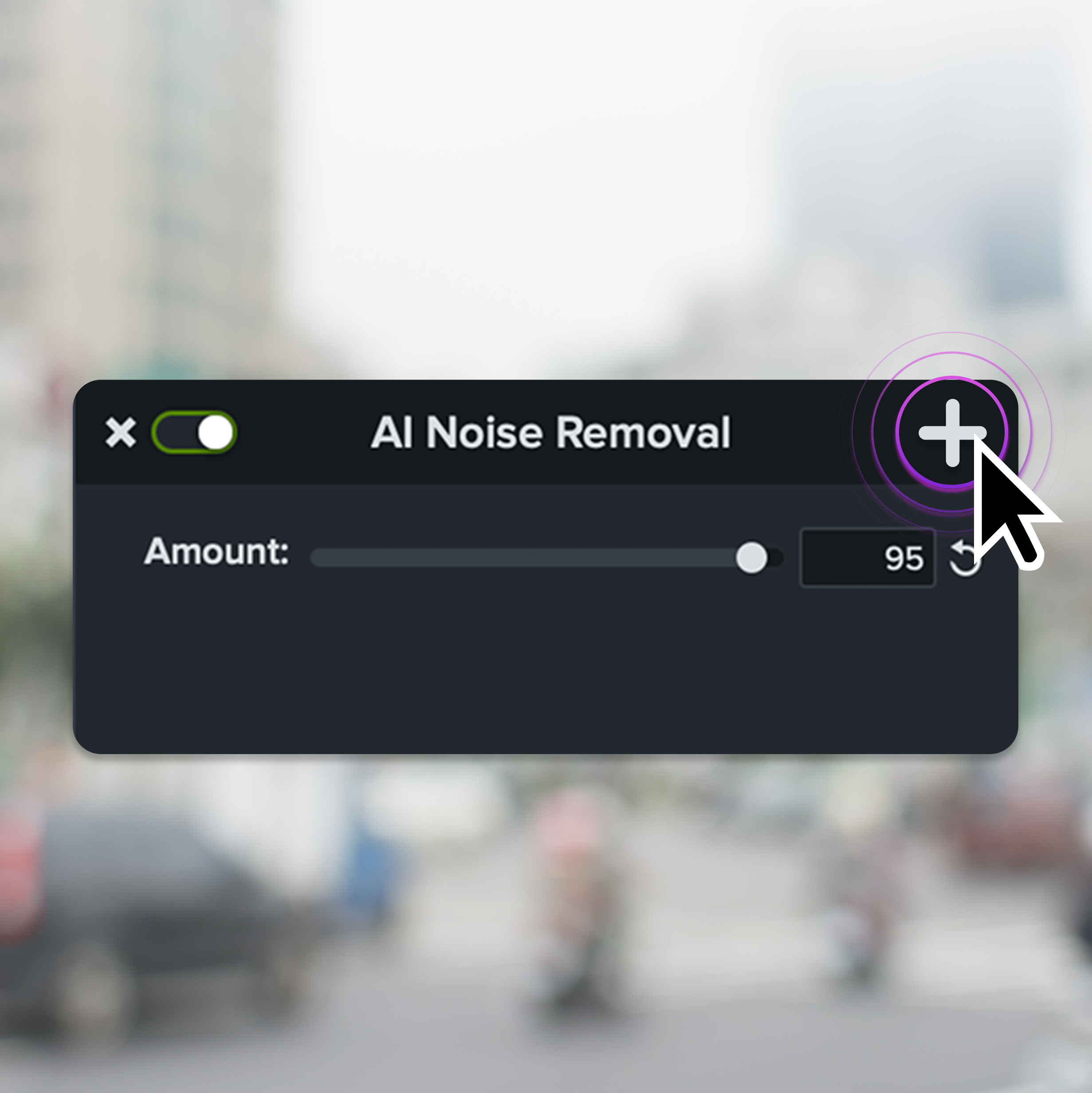 The AI noise removal tool being applied with a city in the background.